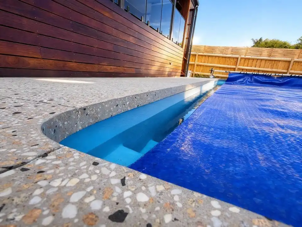 Finished concrete pool surround